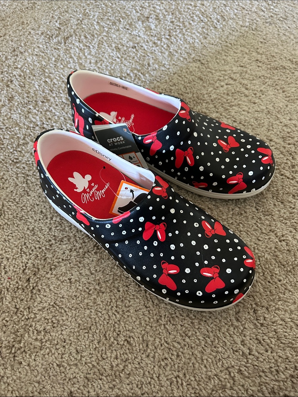 CROCS Women’s Minnie Mouse Bow Print Slip-On Sneakers in Black and Red